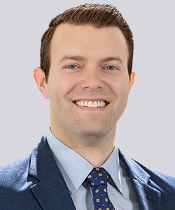Smiling man in suit and tie